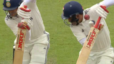 Shubman Gill recoils after being hit by a bouncer from Ben Stokes.