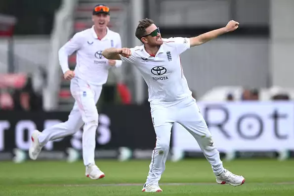 Liam Dawson celebrates taking Jaiswal's wicket.