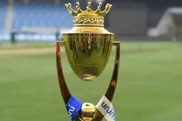 Asia Cup trophy against the backdrop of the UAE skyline